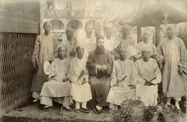 Bishop Banister with a group of Chinese men