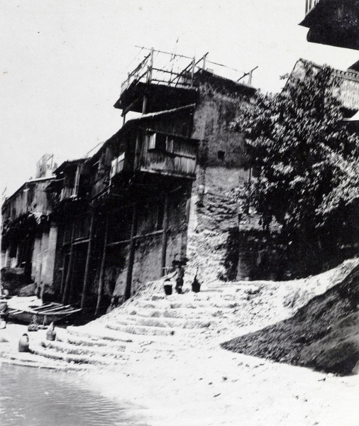 Water carriers at the city gate in winter, Yungchow