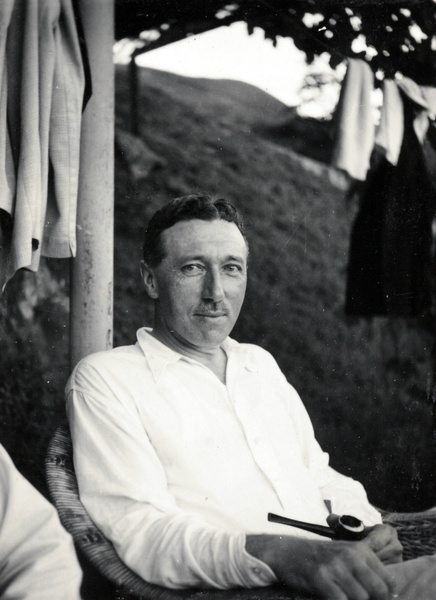 Norman Lockhart Smith relaxing on veranda