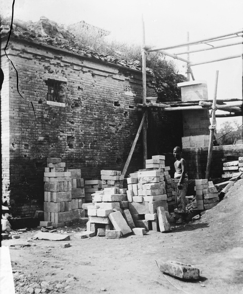 Repairing the 'Lest we forget' corner, British legation, Peking