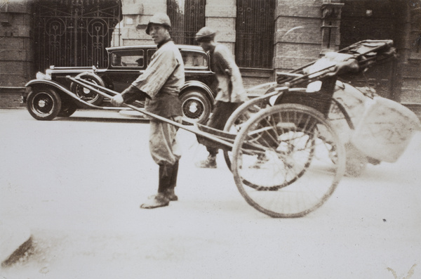 Side by side: rickshaw, porter, and saloon car