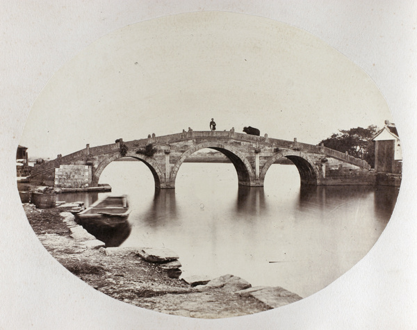 A three-arched bridge over a canal, near Ningbo