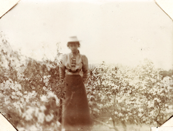 Muriel Carrall with flowers