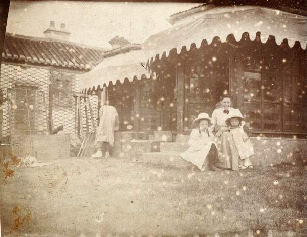 Group outside a bungalow