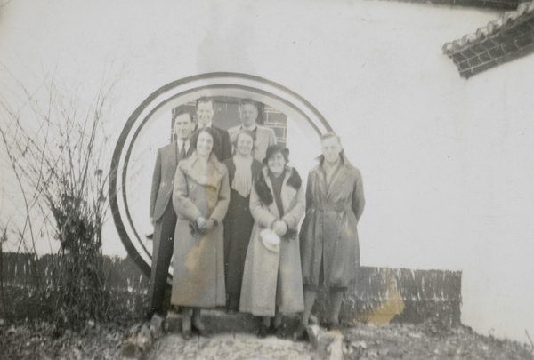 Group beside moon gate, Chaotung