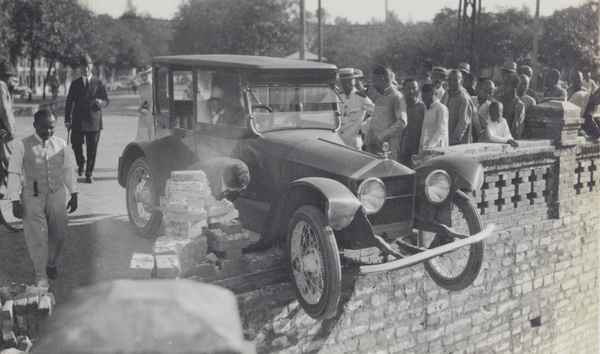 Road accident - a car crashed into a wall, Beijing