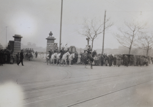 Shanghai Municipal Police Sikh Mounted Troop heading the column, Shanghai Volunteer Corps route march, 1930