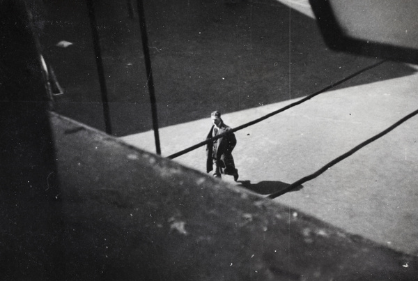 Mr Pulman, crossing a printing factory yard, Pudong, Shanghai