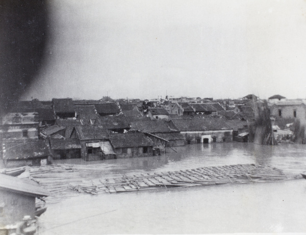 Raft of bamboo culms on flooded Yangzi River, Anqing, 1931