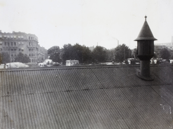 Hankou bund, with hulk roof in foreground, Wuhan