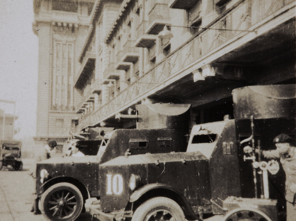 Jim Marsh refuelling armoured car number 10, Shanghai Volunteer Corps, 1932