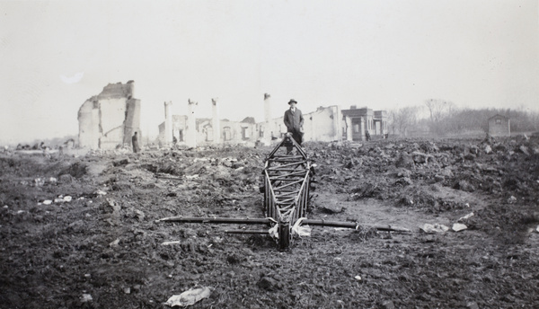 Bomb damaged buildings and aircraft frame, Hongqiao aerodrome, Shanghai, 1932