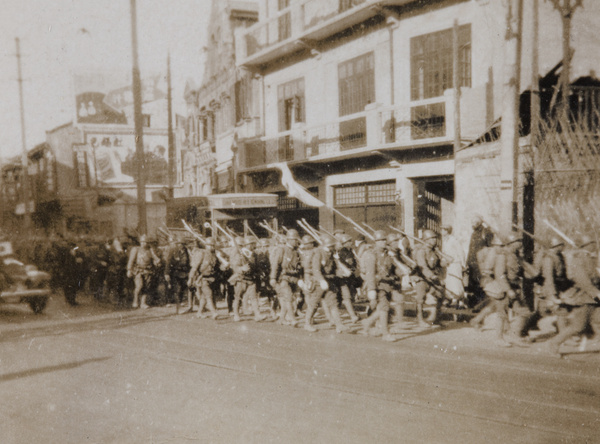 Japanese troops withdrawing after ceasefire agreement, Shanghai, 1932