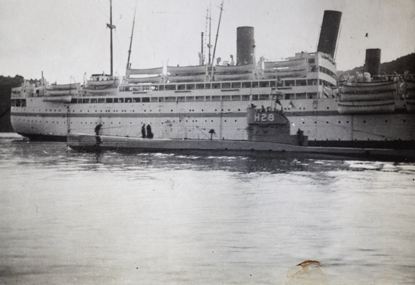 HMS H28 (a Royal Navy submarine) alongside a ship, Shanghai, 1932