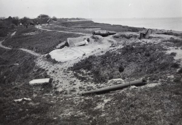 Damaged artillery beside the Huangpu River, near Shanghai