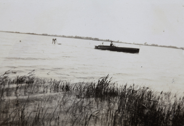 Motorboat and water-skiers