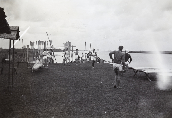 Shanghai Rowing Club oarsmen and boats, beside Huangpu river