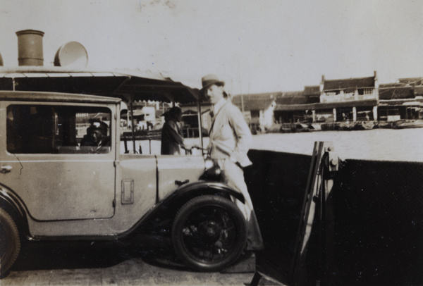 A car and passengers on a ferry, West Lake, Hangzhou