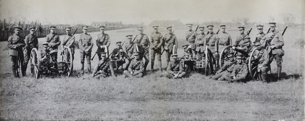 Shanghai Volunteer Corps soldiers, with rifles and field guns