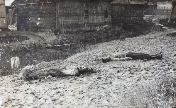 The bodies of two men, executed by a creek