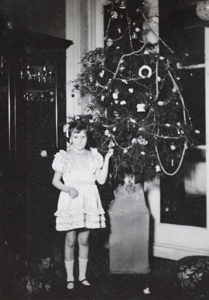 Peggie Clements with a Christmas tree, Shanghai