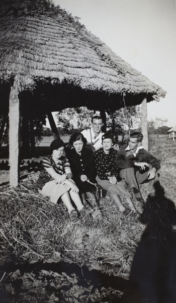 Jack Ephgrave and friends, beside a water pump, near Shanghai Rowing Club