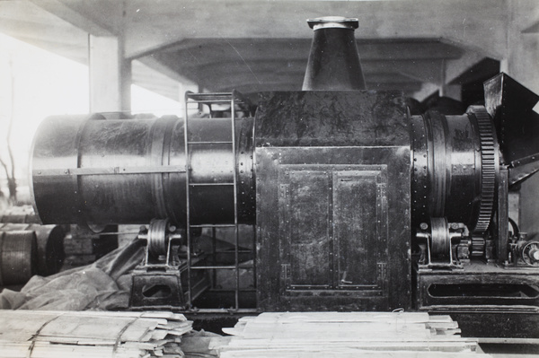 A machine with bundles of wood at a factory, Pudong, Shanghai