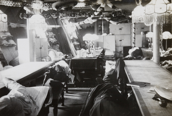 Royal Navy personnel resting after a Christmas party, Hong Kong