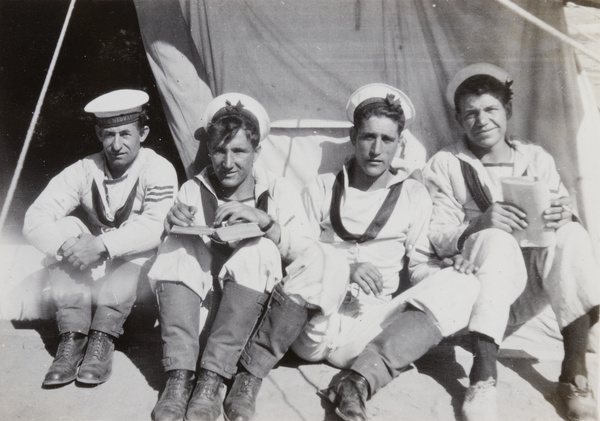 Royal Navy (HMS Medway) sailors reading, Hong Kong