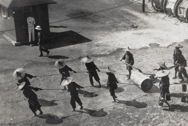 Women road menders, with a roller, Hong Kong