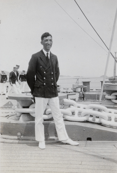 F. Hagger by anchor chain, with other crew, H.M.S. Medway