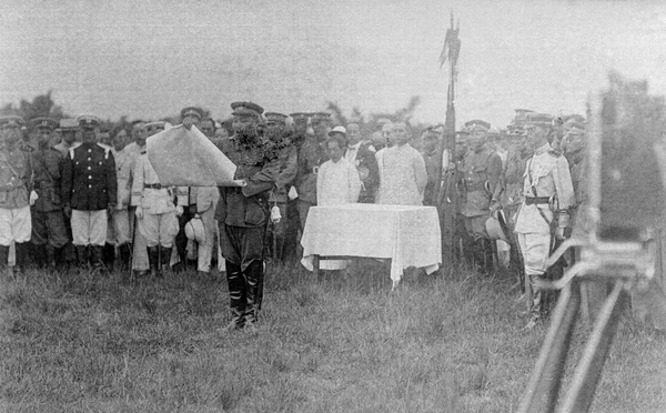 Reading a proclamation with Sun Yat-sen and Liao Zhongkai