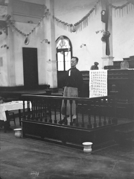 Hu Hanmin, standing on a podium