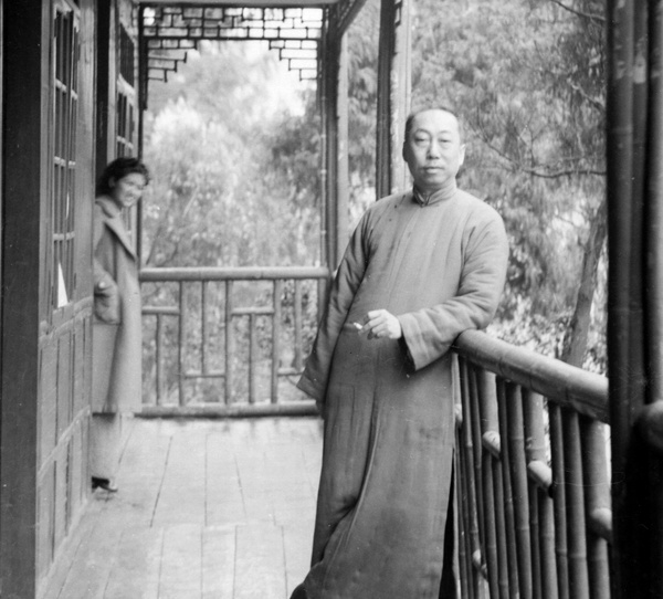 A man smoking on a balcony, Northern Hot Springs Park