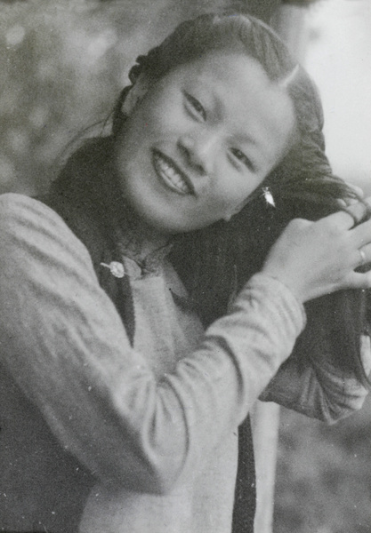 Min Chin twisting her hair, Northern Hot Springs Park