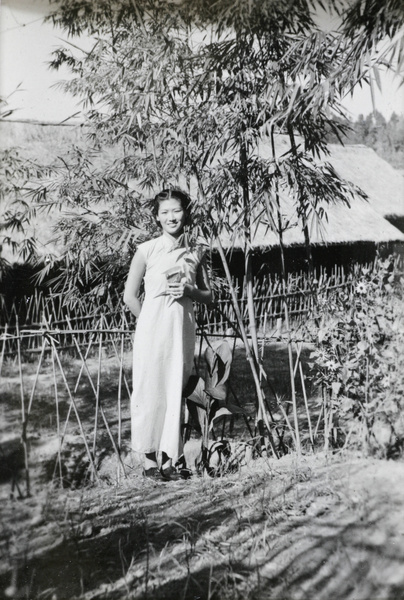 Jiang Fangling in a garden