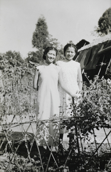 Jiang Fangling with another woman in a garden