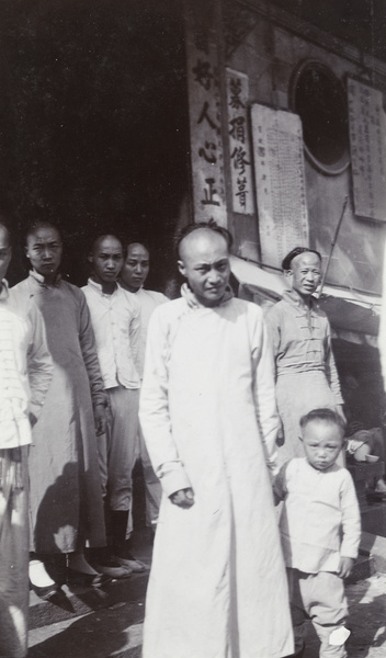 Men and a boy at the City God Temple (上海城隍庙), Shanghai