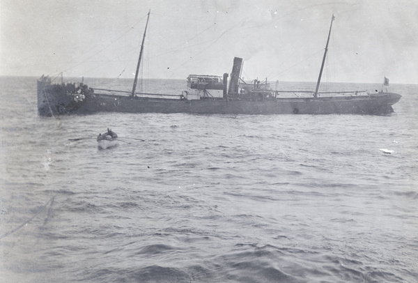 Row boat and steamer