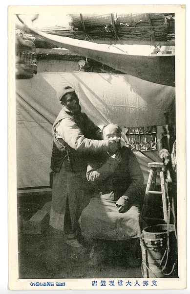 Barber, with customer