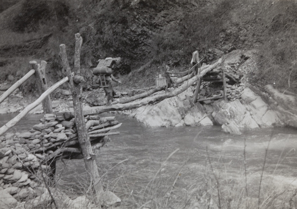 Carriers and Mr Beatty on a cantilever bridge