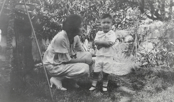 A woman and child in Hong Kong, 1920