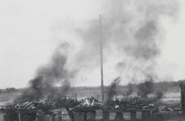 Burning opium at Nanning in 1920