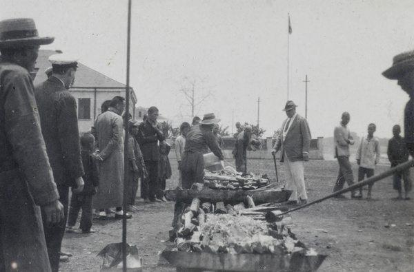 Hedgeland inspecting opium burning at Nanning