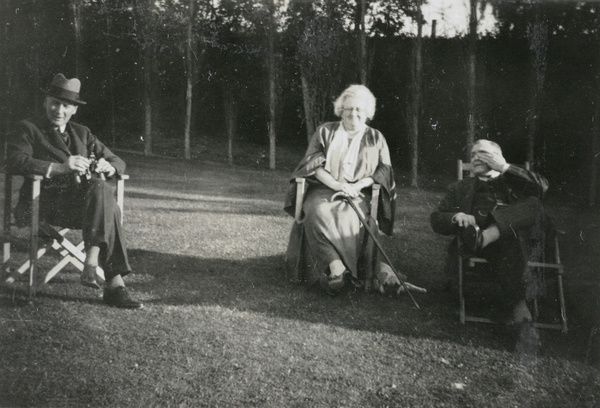 Hedgeland and others sitting outdoors