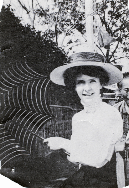 Ella Richard, with a parasol