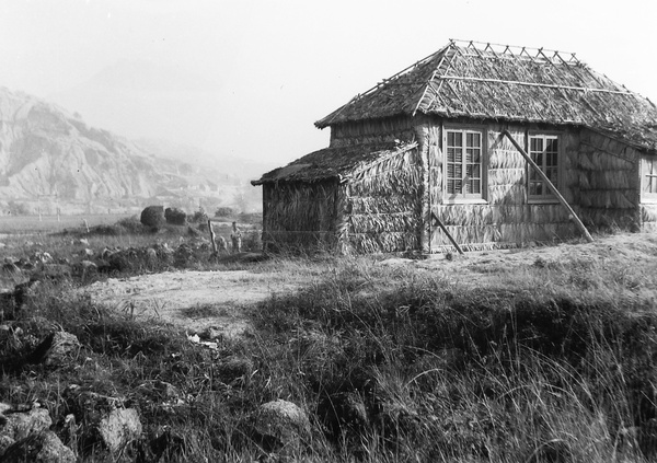 Olav Kulstad beside a matshed building, near the Army Sports Ground, Mongkok, Hong Kong