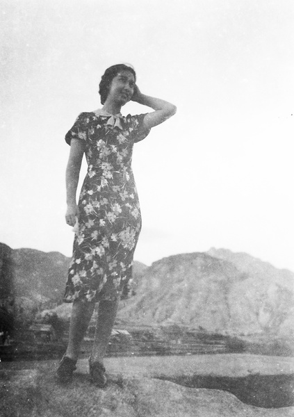 Bea Hutchinson modelling a flower print dress, Hong Kong