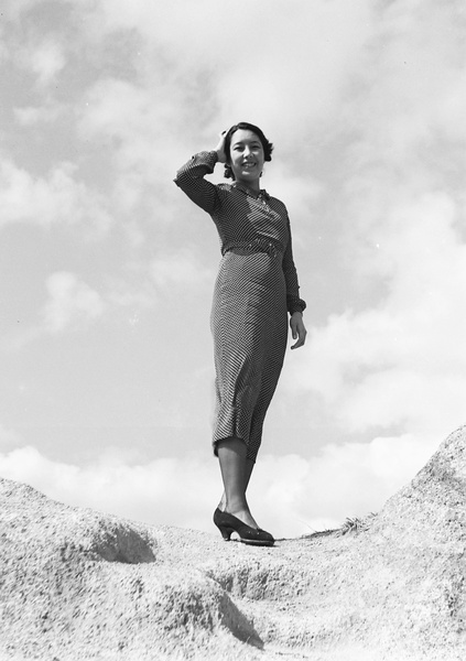 Unidentified woman modelling a polka-dot patterned dress, Hong Kong