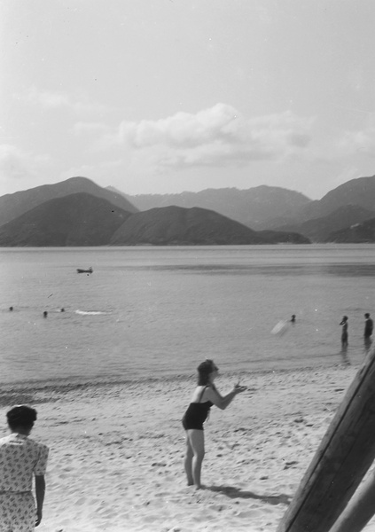 Lucy Shirazee and a friend playing ball, South Bay Beach, Hong Kong